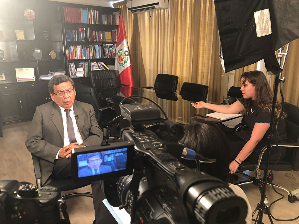 Jacquelyn Kovarik interviews Congressman Hernando Cevallos in his office in Lima, Peru