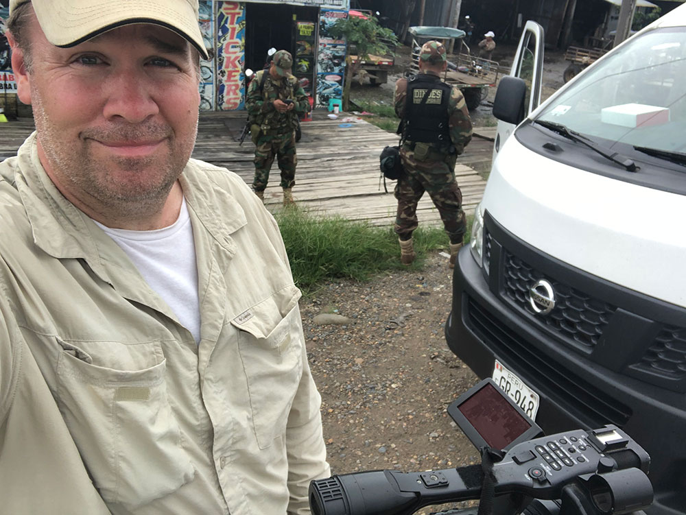 Professor Maloney films in Madre de Dios with police escort