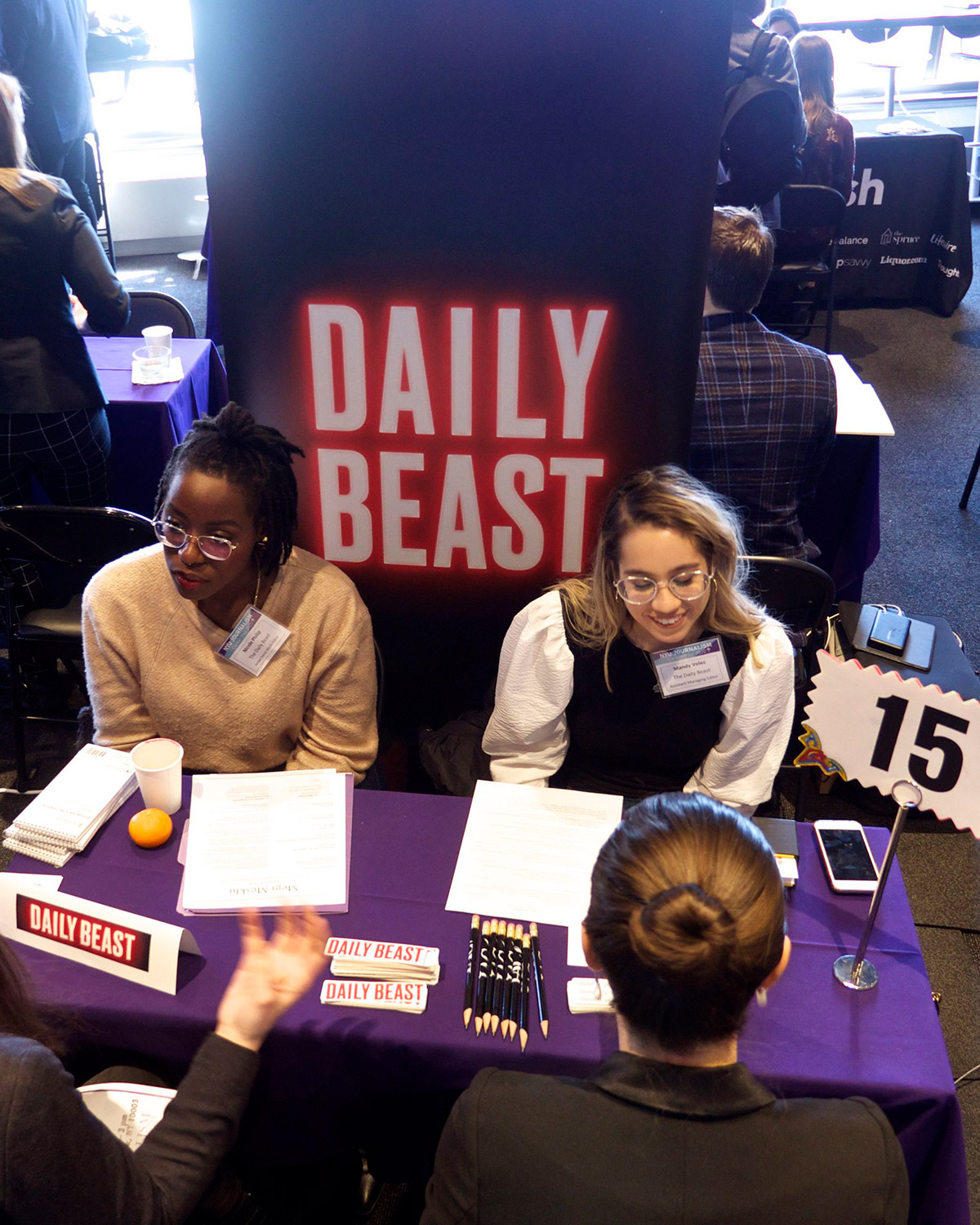 People at a Daily Beast booth at Career Fair 2020