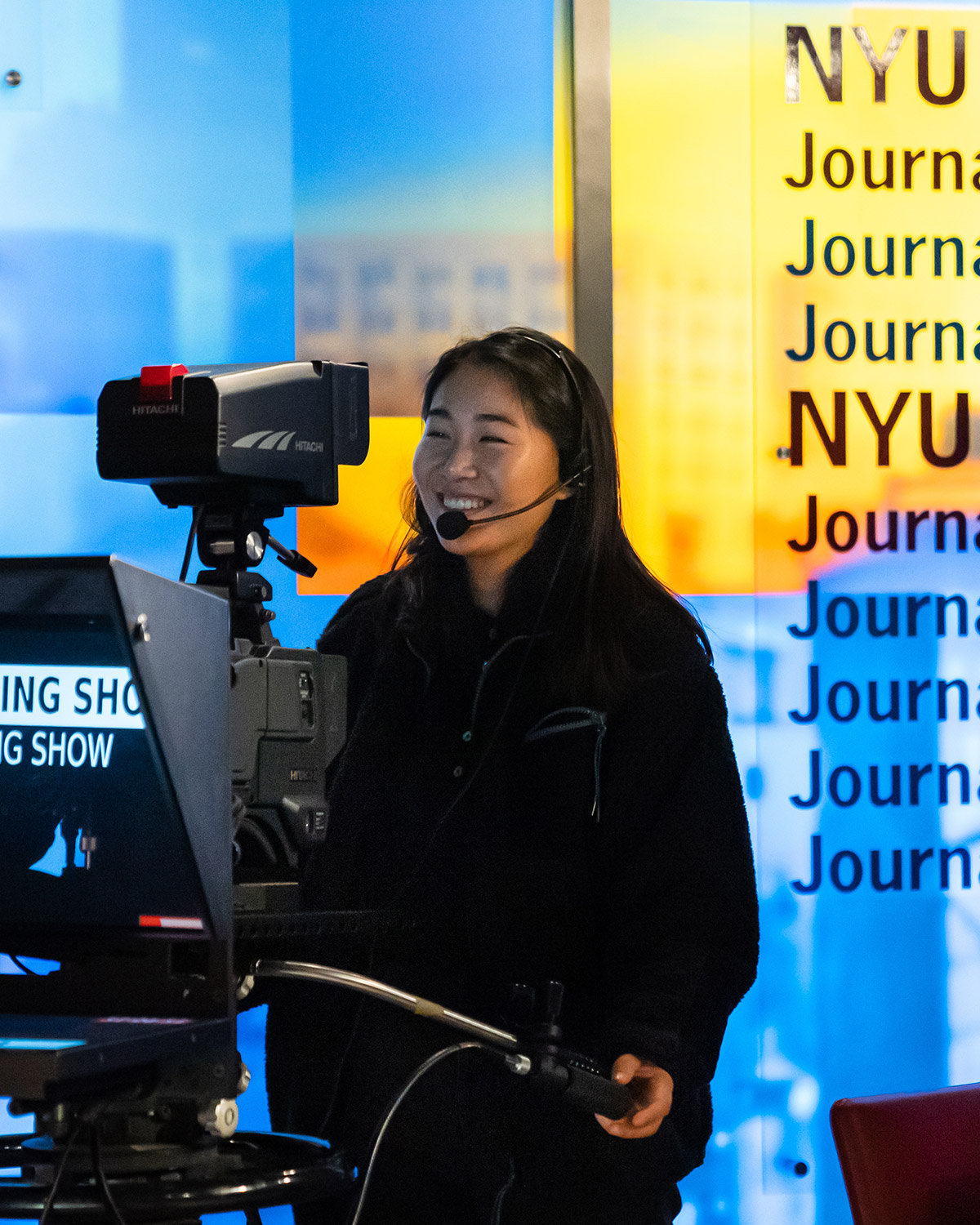 Student at camera in studio