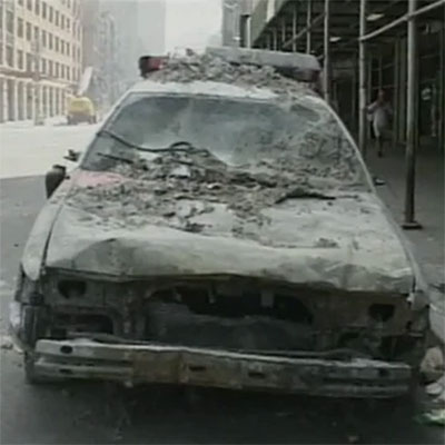 9/11 Coverage - Police car covered in ash