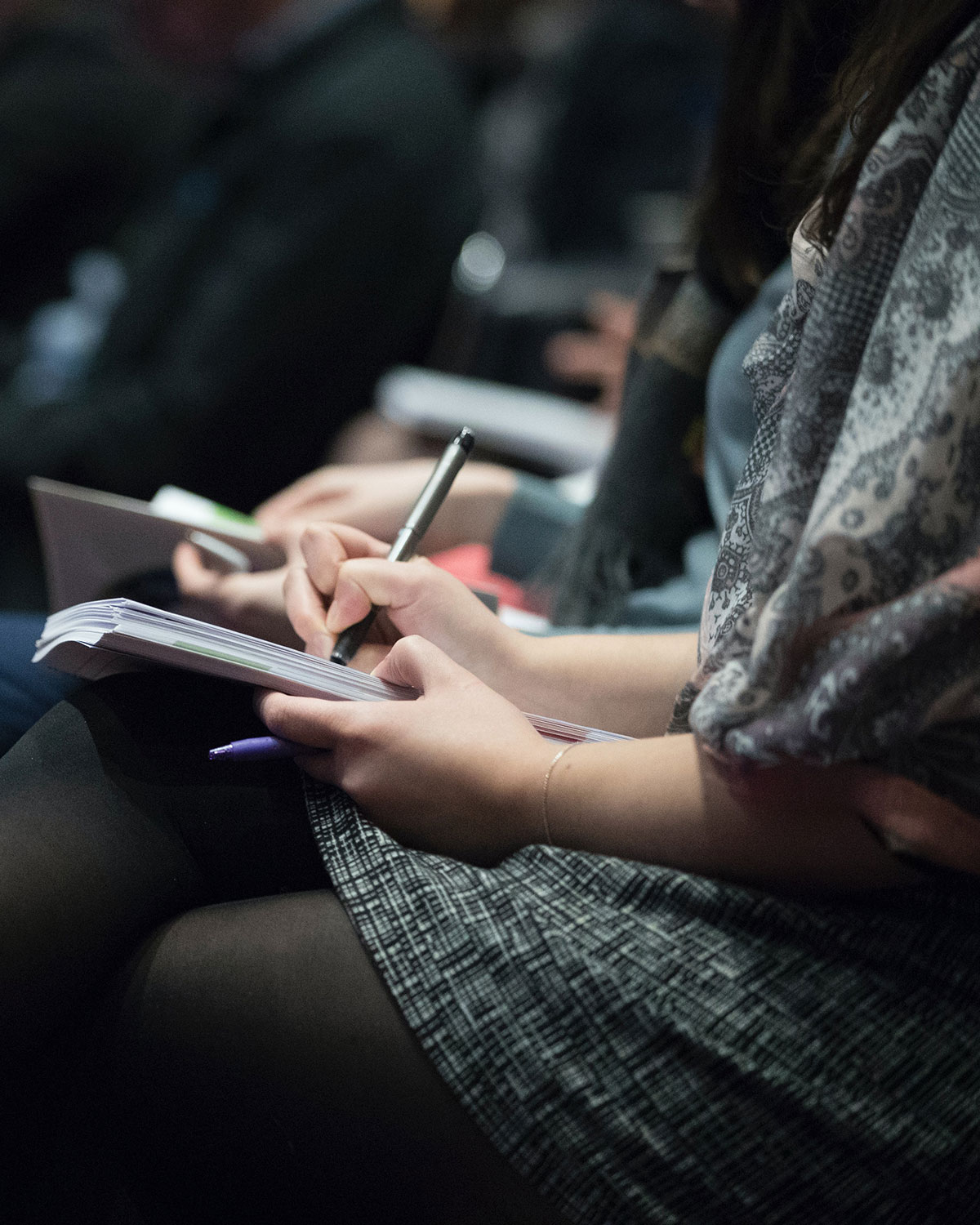 Woman taking notes